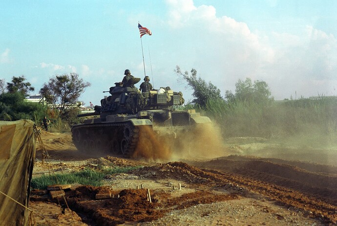 an-m60-main-battle-tank-monitors-a-us-marine-corps-encampment-on-the-outskirts-ad5329-1600