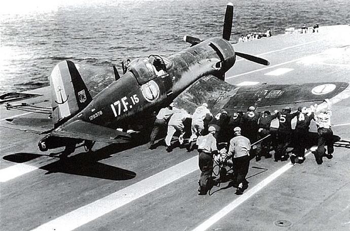 Vought-F4U-7-Corsair-French-Navy-Flottille-17F15-is-being-pushed-onto-the-catapult-01