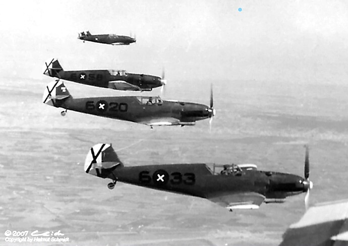 Messerschmitt-Bf-109B2-1.J88-Condor-Legion-6x33-with-6x20-n-6x58-in-formation-over-Spain-1937-01_LI