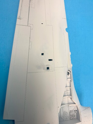 wing ejection ports