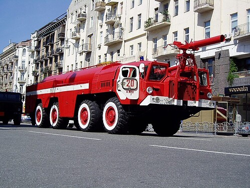 11037