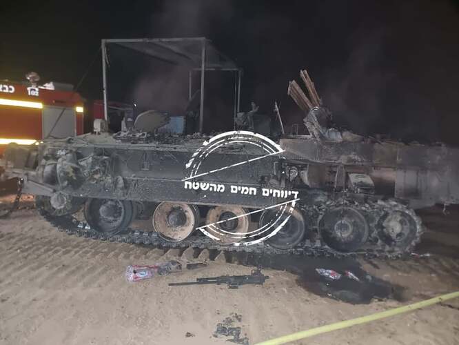 achzarit-armored-personnel-carrier-burned-as-a-result-of-a-v0-vv1mppgipy4c1