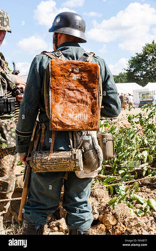 world-war-two-re-enactment-wehrmacht-german-soldier-rear-view-showing-F6NB77