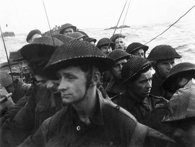 Film_still_from_the_D-Day_landings_showing_commandos_aboard_a_landing_craft_on_their_approach_to_Sword_Beach,_6_June_1944._BU1181