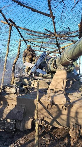 A Russian Lancet drone (loitering munitions) caught in a metal protective net (actually - a fence net) that was stretched over the position of the Ukrainian 155mm howitzer Krab.