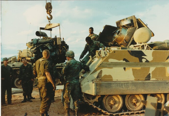 M113 pulling pac Benny Wilkerson in background