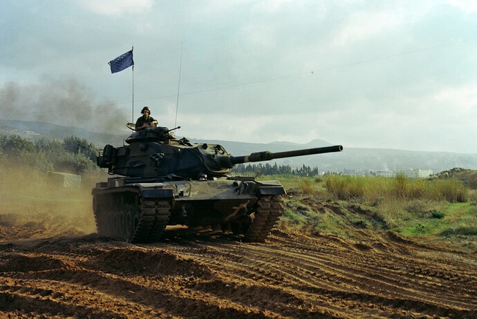 an-m60-main-battle-tank-monitors-a-us-marine-corps-encampment-on-the-outskirts-107a29-1600