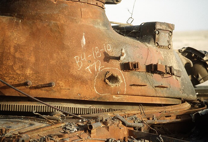 a-close-up-view-of-the-turret-of-an-iraqi-t-72-main-battle-tank-destroyed-during-3c80e9-1600