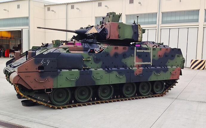 A U.S. Army Bradley Fighting Vehicle painted woodl