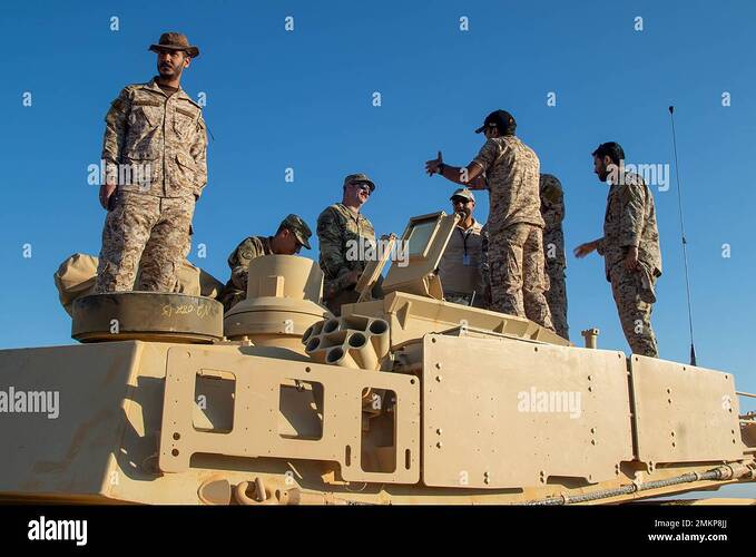 us-army-soldiers-from-the-1st-combined-arms-battalion-163rd-cavalry-regiment-share-knowledge-with-the-royal-saudi-land-forces-about-m1-abrams-tanks-dur