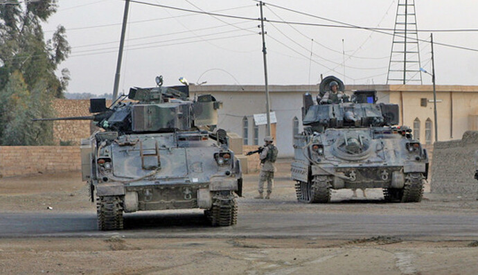 us-army-m2a2-bradley-fighting-vehicles-and-soldiers-with-the-1st-battalion