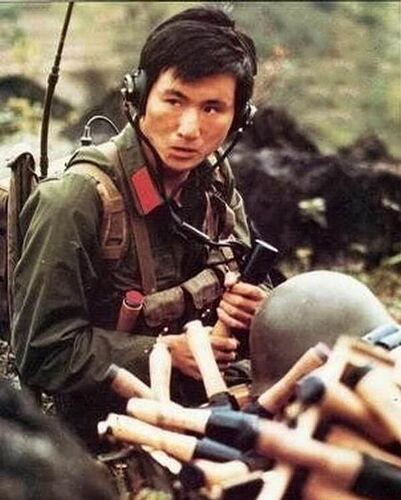 PLA Soldier Yang Qiliang, picture taken in 1984. Yang was the last man standing when a battalion of PAVN attacked his squad's position on Height 166. He managed to hold his position for 4 hours until relieved.