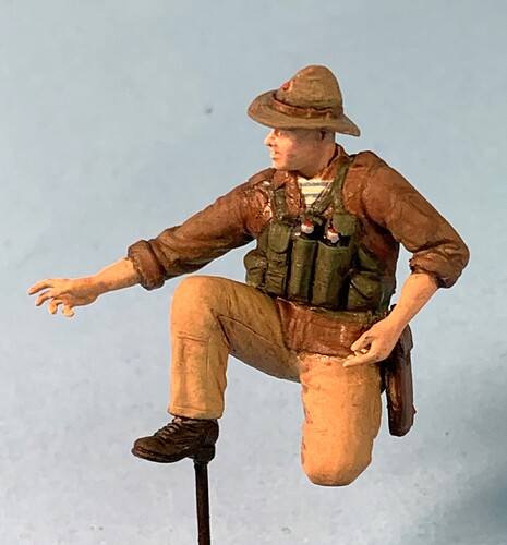Tee on kneeling figure 3